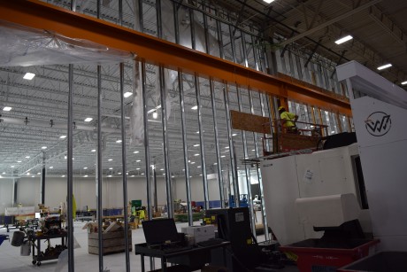 11-10-22: Temporary wall panels are removed between the existing facility and the expansion